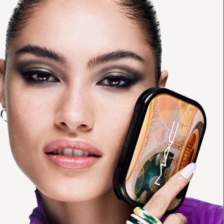 Model with MAC Cosmetics product.